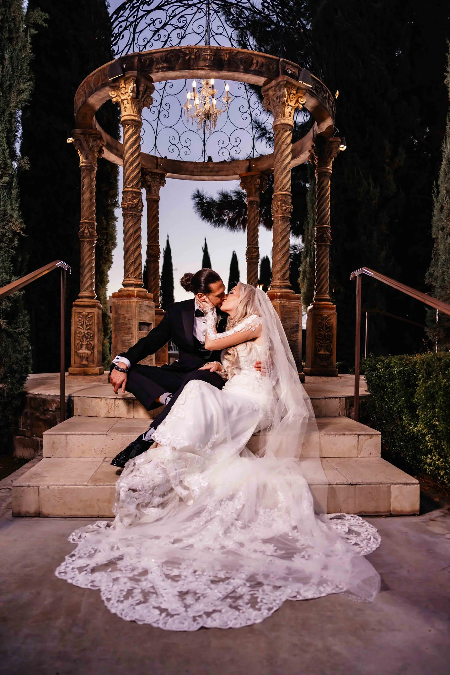 savannah-and-michael-wedding-bride-and-groom-portrait-in-front-of-greenery-photo-gilbert-arizona